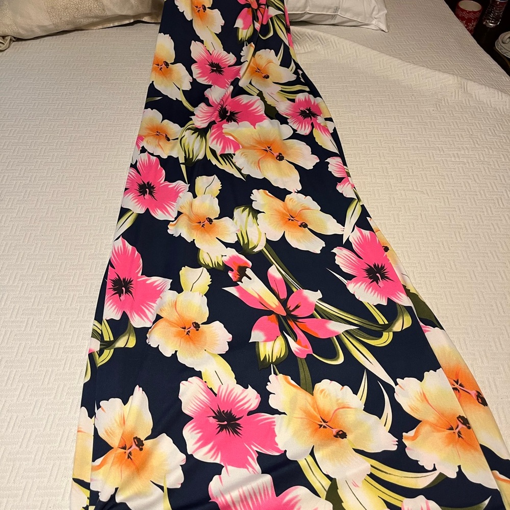 A beautiful off the shoulder long flowing dress.